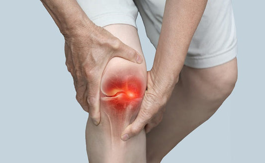 gripping knees because of joint pain